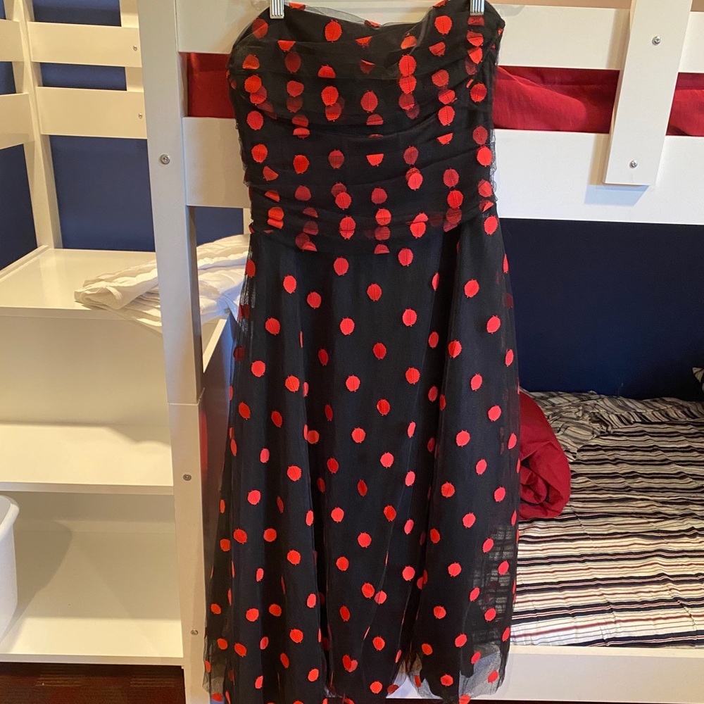 If you are ready to party this strapless polka dot tulle dress is for you
